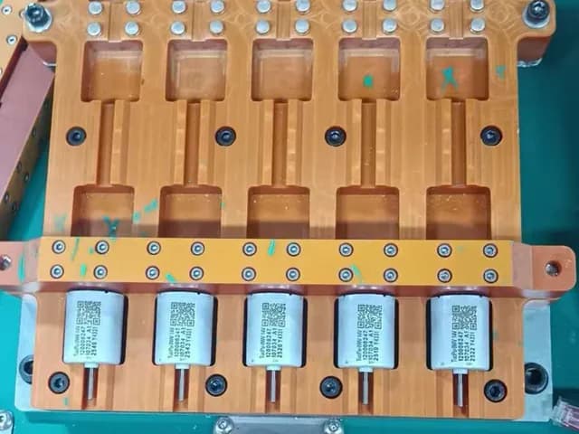 汽车座椅电机放置在专用生产检测工装上